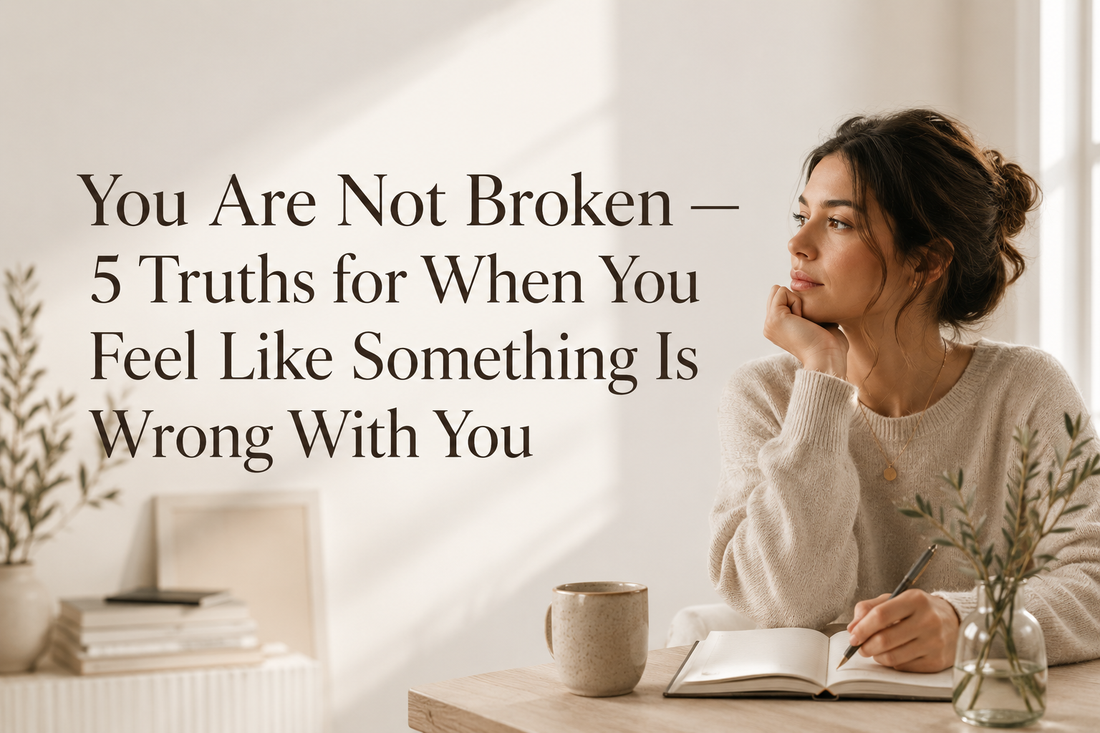 Woman journaling in a calm, sunlit room with the blog title "You Are Not Broken — 5 Truths for When You Feel Like Something Is Wrong With You."